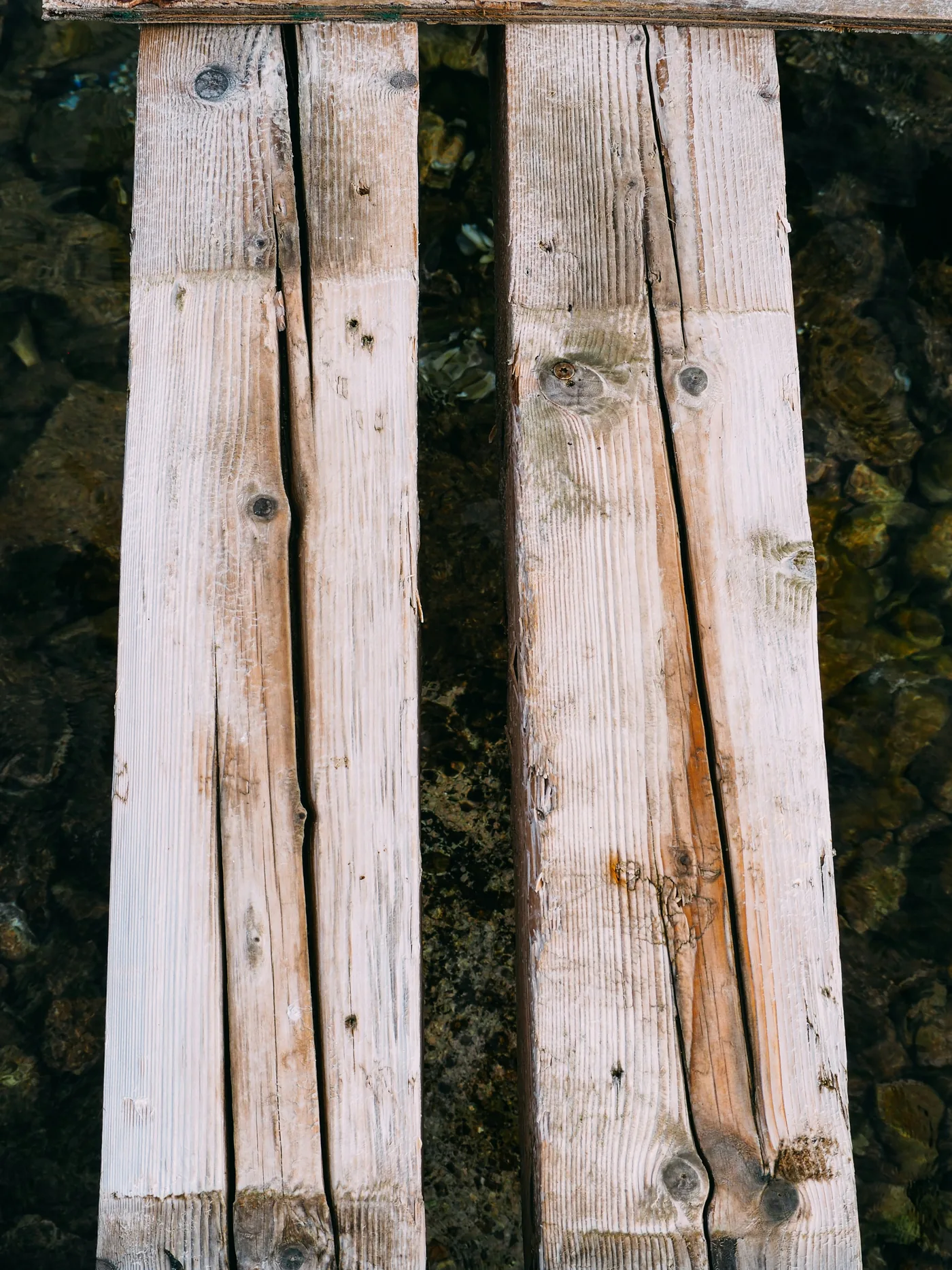 Illustrative close-up photograph of weathered wooden planks